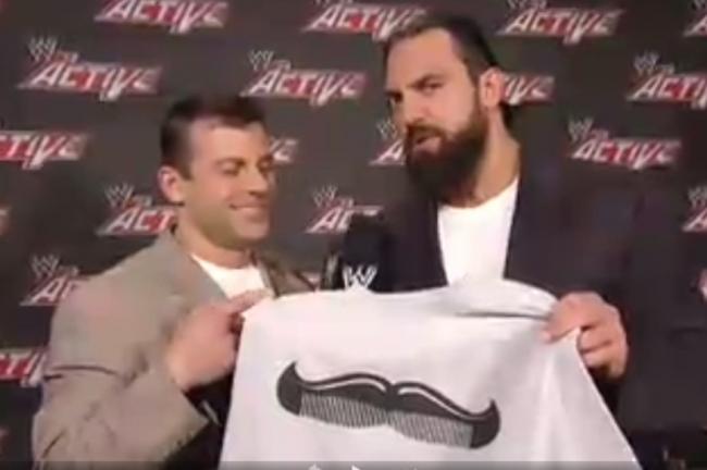 WWE app screenshot (Damien Sandow pushes Cody's new shirt)