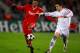 BUDAPEST, HUNGARY - NOVEMBER 24: David Ngog (L) of Liverpool holds off Mirsad Mijadinoski of Debrecen during the UEFA Champions League group E match between Debrecen and Liverpool at the Ferenc Puskas Stadium on November 24, 2009 in Budapest, Hungary. (Photo by Richard Heathcote/Getty Images)