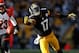 PITTSBURGH, PA - DECEMBER 23: Mike Wallace #17 of the Pittsburgh Steelers catch make a first quarter catch next to Terence Newman #23 of the Cincinnati Bengals at Heinz Field on December 23, 2012 in Pittsburgh, Pennsylvania. (Photo by Gregory Shamus/Getty Images)