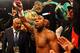 LAS VEGAS, NV - MAY 05: Floyd Mayweather Jr. holds up his arm before taking on Miguel Cotto during their WBA super welterweight title fight at the MGM Grand Garden Arena on May 5, 2012 in Las Vegas, Nevada. (Photo by Al Bello/Getty Images)