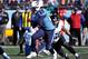 NASHVILLE, TN - DECEMBER 30: Chris Johnson #28 of the Tennessee Titans rushes against the Jacksonville Jaguars at LP Field on December 30, 2012 in Nashville, Tennessee. (Photo by Frederick Breedon/Getty Images)