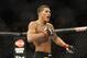 Jan 26, 2013; Chicago, IL, USA; Anthony Pettis celebrates after defeating Donald Cerrone (not pictured) during UFC on FOX 6 at the United Center. Mandatory Credit: David Banks-USA TODAY Sports