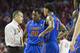 FAYETTEVILLE, AR - FEBRUARY 5: Head Coach Billy Donovan talks with Michael Frazier II #20 and Mike Rosario #3 of the Florida Gators during a game against the Arkansas Razorbacks at Bud Walton Arena on February 5, 2013 in Fayetteville, Arkansas. The Razorbacks defeated the Gators 80-69. (Photo by Wesley Hitt/Getty Images)