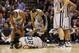 Dec 15, 2012; San Antonio, TX, USA; San Antonio Spurs guard Manu Ginobili (20) is injured on a play during the first half against the Boston Celtics at the AT&T Center. Mandatory Credit: Soobum Im-USA TODAY Sports