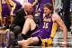 Feb. 5, 2013; Brooklyn, NY, USA; Los Angeles Lakers power forward Pau Gasol (16) is checked by the trainer after an apparent injury on the court against the Brooklyn Nets during the second half at Barclays Center. Lakers won 92-83. Mandatory Credit: Debby Wong-USA TODAY Sports