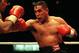 8 Apr 2000: Hector Camacho throws a right hook at Bob Elkins during the third round at Joe Louis Arena in Detroit, Michigan. Camacho won by technical knockout. Mandatory Credit: Tom Pidgeon/ALLSPORT
