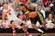 COLUMBUS, OH - JANUARY 22: Aaron Craft #4 of the Ohio State Buckeyes defends as Roy Devyn Marble #4 of the Iowa Hawkeyes drives the baseline in the second half on January 22, 2013 at Value City Arena in Columbus, Ohio. Ohio State defeated Iowa 72-63. (Photo by Jamie Sabau/Getty Images)