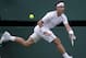 June 28, 2012; London, ENGLAND; Rafael Nadal (ESP) returns a shot against Lukas Rosol (CZE) on day four of the 2012 Wimbledon Championships at the All England Lawn Tennis Club. Mandatory Credit: Susan Mullane-USA TODAY Sports
