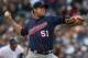 DETROIT, MI - SEPTEMBER 22: Anthony Swarzak #51 of the Minnesota Twins winds up for a pitch against the Detroit Tigers at Comerica Park on September 22, 2012 in Detroit, Michigan. (Photo by Dave Reginek/Getty Images)