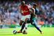LONDON, ENGLAND - AUGUST 18: Abou Diaby of Arsenal and Stephane Sessegnon of Sunderland compete for the ball during the Barclays Premier League match between Arsenal and Sunderland at Emirates Stadium on August 18, 2012 in London, England. (Photo by Mike Hewitt/Getty Images)