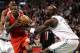 Feb 3, 2013; Boston, MA, USA; Los Angeles Clippers point guard Eric Bledsoe (12) drives to the hoop against Boston Celtics power forward Kevin Garnett (5) during the first half at TD Garden. Mandatory Credit: Mark L. Baer-USA TODAY Sports