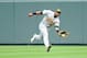 Yoenis Cespedes flashes range and makes a play.