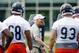 May 11, 2012; Lake Forest, IL, USA; Chicago Bears defensive coordinator Rod Marinelli (middle) talks with the defensive linemen during rookie minicamp at Halas Hall. Mandatory Credit: Jerry Lai-USA TODAY Sports