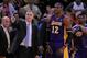 December 22, 2012; Oakland, CA, USA; Los Angeles Lakers head coach Mike D'Antoni (left) and center Dwight Howard (12) react after Howard fouled out during the overtime quarter against the Golden State Warriors at ORACLE Arena. The Lakers defeated the Warriors 118-115 in overtime. Mandatory Credit: Kyle Terada-USA TODAY Sports