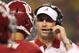 Sep 1, 2012; Arlington, TX, USA; Alabama Crimson Tide receiver coach Mike Groh talks with quarterback A.J. McCarron (10) during the game against the Michigan Wolverines at Cowboys Stadium. Alabama beat Michigan 41-14. Mandatory Credit: Matthew Emmons-USA TODAY Sports