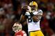 SAN FRANCISCO, CA - JANUARY 12: wide receiver Greg Jennings #85 of the Green Bay Packers catches a pass over cornerback Carlos Rogers #22 of the San Francisco 49ers during the NFC Divisional Playoff Game at Candlestick Park on January 12, 2013 in San Francisco, California. (Photo by Thearon W. Henderson/Getty Images)