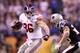 INDIANAPOLIS, IN - FEBRUARY 05: Bear Pascoe #86 of the New York Giants runs the ball against Patrick Chung #25 of the New England Patriots during Super Bowl XLVI at Lucas Oil Stadium on February 5, 2012 in Indianapolis, Indiana. (Photo by Elsa/Getty Images)