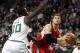 Feb 3, 2013; Boston, MA, USA; Boston Celtics power forward Brandon Bass (30) defends Los Angeles Clippers power forward Blake Griffin (right) during the first half at TD Garden. Mandatory Credit: Mark L. Baer-USA TODAY Sports