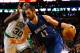 BOSTON, MA - DECEMBER 5: Kevin Love #42 of the Minnesota Timberwolves drives to the basket in front of Brandon Bass #30 of the Boston Celtics during the game on December 5, 2012 at TD Garden in Boston, Massachusetts. NOTE TO USER: User expressly acknowledges and agrees that, by downloading and or using this photograph, User is consenting to the terms and conditions of the Getty Images License Agreement. (Photo by Jared Wickerham/Getty Images)