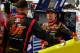 CHARLOTTE, NC - OCTOBER 12: Clint Bowyer, driver of the #15 5-Hour Energy Benefiting Avon Foundation for Women Toyota, talks to Jeff Gordon, driver of the #24 Drive to End Hunger Chevrolet, in the garage during practice for the NASCAR Sprint Cup Series Bank of America 500 at Charlotte Motor Speedway on October 12, 2012 in Charlotte, North Carolina. (Photo by Tyler Barrick/Getty Images for NASCAR)