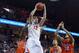 February 7, 2013; Charlottesville, VA USA; Virginia Cavaliers guard Joe Harris (12) shoots the ball as Clemson Tigers guard Adonis Filer (3) defends in the second half at John Paul Jones Arena. The Cavaliers won 78-41. Mandatory Credit: Geoff Burke-USA TODAY Sports