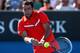 MELBOURNE, AUSTRALIA - JANUARY 15: Marin Cilic of Croatia plays a backhand in his first round match against Marinko Matosevic of Australia during day two of the 2013 Australian Open at Melbourne Park on January 15, 2013 in Melbourne, Australia. (Photo by Chris Hyde/Getty Images)