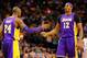 BOSTON, MA - FEBRUARY 7: Dwight Howard #12 of the Los Angeles Lakers is congratulated by teammate Kobe Bryant #24 of the Los Angeles Lakers against the Boston Celtics during the game on February 7, 2013 at TD Garden in Boston, Massachusetts. NOTE TO USER: User expressly acknowledges and agrees that, by downloading and or using this photograph, User is consenting to the terms and conditions of the Getty Images License Agreement. (Photo by Jared Wickerham/Getty Images)