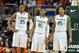 Feb 9, 2013; Coral Gables, FL, USA; Miami Hurricanes forward/center Kenny Kadji (left) guard Rion Brown (center) and forward/center Julian Gamble (right) during the second half against the North Carolina Tar Heels at the BankUnited Center. Miami won 87-61. Mandatory Credit: Steve Mitchell-USA TODAY Sports