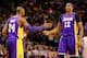 BOSTON, MA - FEBRUARY 7: Dwight Howard #12 of the Los Angeles Lakers is congratulated by teammate Kobe Bryant #24 of the Los Angeles Lakers against the Boston Celtics during the game on February 7, 2013 at TD Garden in Boston, Massachusetts. NOTE TO USER: User expressly acknowledges and agrees that, by downloading and or using this photograph, User is consenting to the terms and conditions of the Getty Images License Agreement. (Photo by Jared Wickerham/Getty Images)