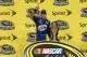 HOMESTEAD, FL - NOVEMBER 18: NASCAR Sprint Cup Series Champion Brad Keselowski, driver of the #2 Miller Lite Dodge, poses with the Championship Trophy after the NASCAR Sprint Cup Series Ford EcoBoost 400 at Homestead-Miami Speedway on November 18, 2012 in Homestead, Florida. (Photo by Tom Pennington/Getty Images)