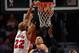 CHICAGO, IL - NOVEMBER 28: Taj Gibson #22 of the Chicago Bulls dunks the ball over Chris Kaman #35 of the Dallas Mavericks at the United Center on November 28, 2012 in Chicago, Illinois. The Bulls defeated the Mavericks 101-78. NOTE TO USER: User expressly acknowledges and agrees that, by downloading and or using this photograph, User is consenting to the terms and conditions of the Getty Images License Agreement. (Photo by Jonathan Daniel/Getty Images)