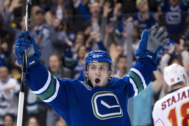 Rookie Schroeder Leads Canucks to Win over Short-Handed Flames