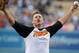 May 18, 2011; Los Angeles, CA, USA; Professional wrestler Mike Mizanin aka The Wiz reacts after throwing out the ceremonial first pitch before the MLB game between the San Francisco Giants and the Los Angeles Dodgers at Dodger Stadium. Mandatory Credit: Kirby Lee/Image of Sport-USA TODAY Sports