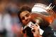 PARIS, FRANCE - JUNE 11: Rafael Nadal of Spain poses with the Coupe des Mousquetaires trophy in the men's singles final against Novak Djokovic of Serbia during day 16 of the French Open at Roland Garros on June 11, 2012 in Paris, France. (Photo by Clive Brunskill/Getty Images)