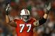 MIAMI - OCTOBER 12: Offensive lineman Jake Long #77 of the Miami Dolphins celebrates after a touchdown by Ronnie Brown #23 against the New York Jets at Land Shark Stadium on October 12, 2009 in Miami, Florida. The Dolphins defeated the Jets 31-27. (Photo by Doug Benc/Getty Images)