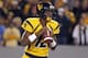 MORGANTOWN, WV - NOVEMBER 17: Geno Smith #12 of the West Virginia Mountaineers drops back to pass against the Oklahoma Sooners during the game on November 17, 2012 at Mountaineer Field in Morgantown, West Virginia. (Photo by Justin K. Aller/Getty Images)