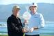 PEBBLE BEACH, CA - FEBRUARY 10: Brandt Snedeker poses with the trophy and his playing partner Toby Wilt on the 18th green after his two-stroke victory at the AT&T Pebble Beach National Pro-Am at Pebble Beach Golf Links on February 10, 2013 in Pebble Beach, California. (Photo by Harry How/Getty Images)