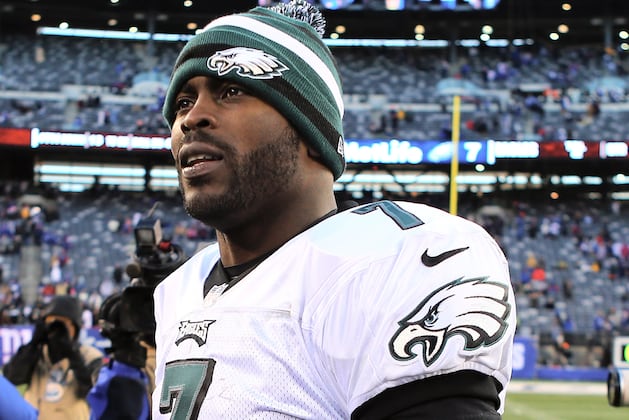 Vick Stays to Compete for QB Job