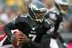 PHILADELPHIA, PA - OCTOBER 28: Quarterback Michael Vick #7 of the Philadelphia Eagles looks to run against the Atlanta Falcons during a game at Lincoln Financial Field on October 28, 2012 in Philadelphia, Pennsylvania. (Photo by Rich Schultz /Getty Images)