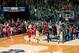 Feb 9, 2013; South Bend, IN, USA; The Notre Dame Fighting Irish student section storms the court as time expires in the fifth overtime against the Louisville Cardinals at the Purcell Pavilion. Notre Dame won 104-101 in five overtimes. Mandatory Credit: Matt Cashore-USA TODAY Sports