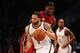 NEW YORK, NY - JANUARY 30: Deron Williams #8 of the Brooklyn Nets drives against LeBron James #6 of the Miami Heat during their game at the Barclays Center on January 30, 2013 in the Brooklyn borough of New York City. NOTE TO USER: User expressly acknowledges and agrees that, by downloading and/or using this photograph, user is consenting to the terms and conditions of the Getty Images License Agreement. (Photo by Al Bello/Getty Images)