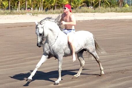 Instagram: Canelo Takes a Break from Training, Rides a Horse on the Beach
