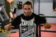 SACRAMENTO, CA - JUNE 26: Chad Mendes points to his t-shirt before he starts working out for the media during the Team Alpha Male Media Open Workout at Ultimate Fitness Gym on June 26, 2012 in Sacramento, California. (Photo by Thearon W. Henderson/Getty Images)
