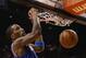 PHOENIX, AZ - DECEMBER 26: J.R. Smith #8 of the New York Knicks slam dunks the ball against the Phoenix Suns during the NBA game at US Airways Center on December 26, 2012 in Phoenix, Arizona. The Knicks defeated the Suns 99-97. NOTE TO USER: User expressly acknowledges and agrees that, by downloading and or using this photograph, User is consenting to the terms and conditions of the Getty Images License Agreement. (Photo by Christian Petersen/Getty Images)