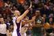 PHOENIX, AZ - DECEMBER 14: Al Jefferson #25 of the Utah Jazz looks to pass the ball under pressure from Marcin Gortat #4 and Jared Dudley #3 of the Phoenix Suns during the NBA game at US Airways Center on December 14, 2012 in Phoenix, Arizona. NOTE TO USER: User expressly acknowledges and agrees that, by downloading and or using this photograph, User is consenting to the terms and conditions of the Getty Images License Agreement. (Photo by Christian Petersen/Getty Images)