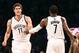 Jan. 30, 2013; Brooklyn, NY, USA; Brooklyn Nets center Brook Lopez (11) high fives shooting guard Joe Johnson (7) against the Miami Heat during the first half at Barclays Center. Mandatory Credit: Debby Wong-USA TODAY Sports