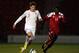 DONCASTER, ENGLAND - FEBRUARY 05: John Stones of England U19 in action with Danny Amankwaa of Denmark U19 during the International Match between England U19 and Denmark U19 at Keepmoat Stadium on February 5, 2013 in Doncaster, England. (Photo by Chris Brunskill/Getty Images)
