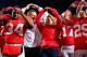 COLUMBUS, OH - NOVEMBER 03: Head Coach Urban Meyer of the Ohio State Buckeyes and his wife, Shelly Meyer sing 'Carmen Ohio' after Ohio State defeated the Illinois Illini 52-22 on November 3, 2012 at Ohio Stadium in Columbus, Ohio. (Photo by Kirk Irwin/Getty Images)