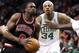 Jan 18, 2013; Boston, MA, USA; Chicago Bulls small forward Luol Deng (left) drives to the basket against Boston Celtics small forward Paul Pierce (34) during the first half at TD Garden. Mandatory Credit: Mark L. Baer-USA TODAY Sports