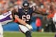 CHICAGO, IL - NOVEMBER 25: Henry Melton #69 of the Chicago Bears rushes against Brandon Fusco #63 of the Minnesota Vikings at Soldier Field on November 25, 2012 in Chicago, Illinois. The Bears defeated the Vikings 28-10. (Photo by Jonathan Daniel/Getty Images)